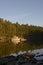 Pleasure boats in still water at the dock in Conover Cove, Wallace Island, Gulf Islands, British Columbia