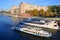 Pleasure boats `Svyatogor` and `Beauty` near a residential Government House. Moscow, Russia