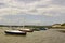 Pleasure boats on their moorings in the historic Bosham Harbour in West Sussex in the South of England