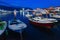 Pleasure boats and yachts at pier on embankment of Budva, Montenegro