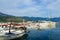 Pleasure boats and yachts at pier on waterfront of Budva, Montenegro