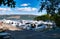 The pleasure hire boats of tourists on holiday moored at Urquhart Bay Harbour on Loch Ness in the Great Glen, Scotland, UK