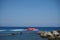 A pleasure motor boat carries tourists off the coast of the city of Rhodes, Greece