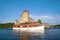 A pleasure ship passes by the ancient Olavinlinna fortress. Savonlinna