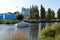 A pleasure speedboat sails along the Tsna river in Tambov along the embankment