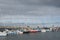 Pleasure yachts in a marina on a clouded sky