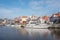 Pleasure yachts and sail boats in the port of Lemmer in Friesland, Netherlands