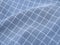 Pleated checkered blue fabric