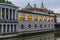 Plecnik arcade market building and Ljubljanica river in Ljubljana, Sloven