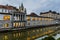 Plecnik arcade market building reflecting in Ljubljanica river in Ljubljana, Sloven