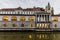 Plecnik arcade market building reflecting in Ljubljanica river in Ljubljana, Sloven