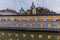 Plecnik arcade market building reflecting in Ljubljanica river in Ljubljana, Sloven