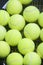 Plenty of tennis Balls on Raquet Strings