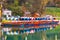 Pletna boats ,famous Bled Lake in Triglav National Park in the Julian Alps with in autumn colors