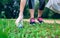 Plogging. Girl hand picking up garbage