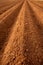 Ploughed red clay soil agriculture fields