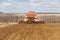 ploughed soil on which cereals are grown