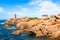 The Ploumanac`h lighthouse on the Pink Granite Coast in northern Brittany, France