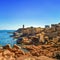 Ploumanach lighthouse morning in pink granite coast, Brittany, France.