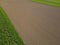 Plowed agriculture field with soil from above