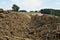 Plowed field, preparation for sowing. Agricultural landscape. Detail.