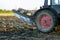 Plowed field tractor in soil on open countryside nature