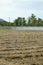 Plowed soil in vegetable plots With sprinkler systems and water pipes