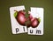 Plum fruits in puzzle
