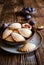 Plum pocket pies studded with powdered sugar