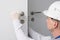 Plumber, checks the correct operation of the locking devices of the door lock