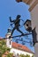 Plumber figure on the wall in Maribor, Slovenia