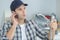 Plumber on phone talking to customer on phone