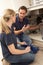 Plumber Teaching Apprentice To Fix Kitchen Sink