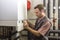 Plumber who carries out the maintenance of a condensing boiler