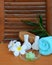 Plumeria flowers and spa accessories.