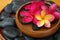 Plumeria in wooden bowl