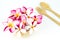 Plumeria and wooden spoon and frok on white background