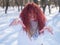 The plump-cheeked woman threw her red hair over her face and held out her arms like a zombie. Girl fooling around in the