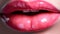 Plump passionate lips close-up. Sexy glossy lip makeup. Macro of female part of face. Beautiful makeup, pink lipstick