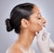 Plumping up those cheek bones. Shot of an attractive young woman getting filler injections in the studio.