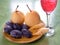 Plums pears and wineglass