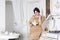 Plus size fashion model on kitchen, fat woman on luxury interior, overweight female body