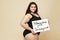 Plus Size Model. Beautiful Fat Woman Portrait. Brunette Holding Motivational Poster.