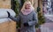 Plus size woman walk on a European old city street and goes shopping for fashion