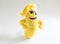 Plush children`s toy - funny banana. Fruit with big eyes, smile, peeled skin.