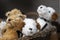 plush puppies in a wicker basket, stuffed toys on the counter. close up