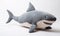 The plush shark, adorned with a cute bowtie, brought a touch of whimsy to the nursery decor