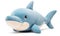 The plush shark was carefully placed on the shelf, its vibrant colors and realistic features catching the eye of passersby