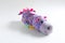 Plush soft children`s toy purple dragon with colorful round spots. Turn it inside out.