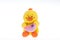 Plush yellow chicken with a heart